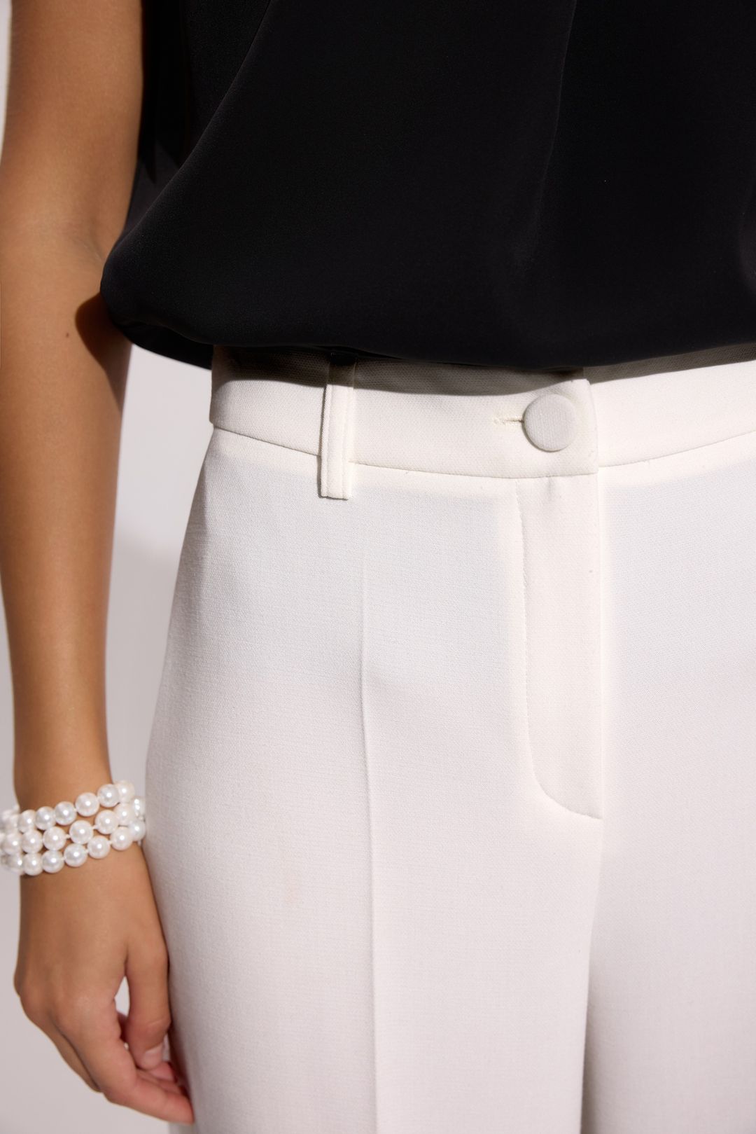 Eleganckie spodnie damskie ecru – kolekcja Exclusive