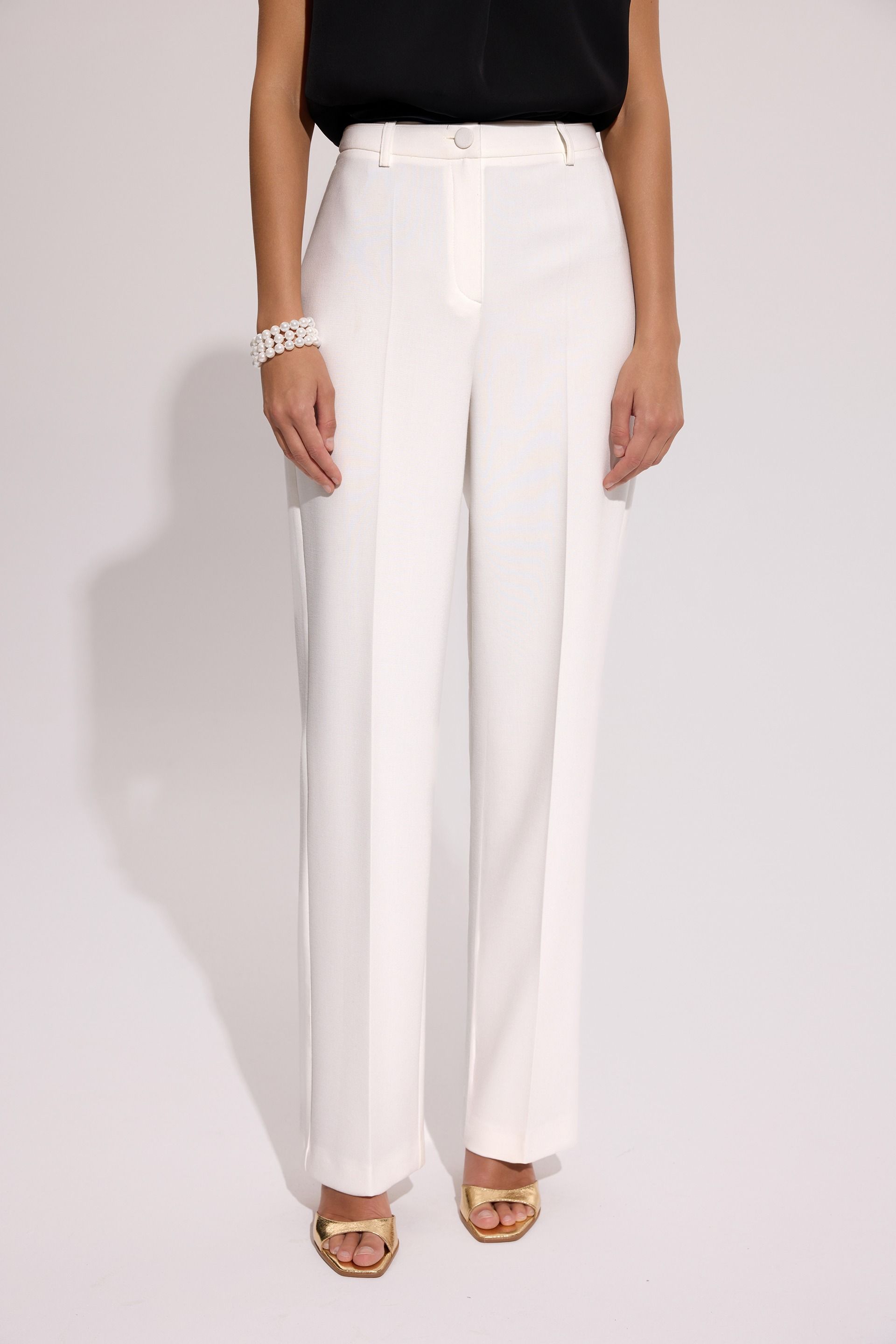Eleganckie spodnie damskie ecru – kolekcja Exclusive