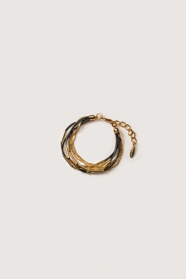 Czarno-złota bransoletka z ozdobnymi elementami Makalu
