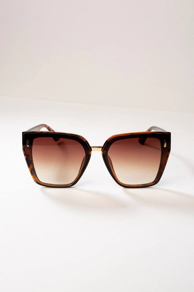 Brązowe okulary przeciwsłoneczne w panterkowej oprawie Makalu