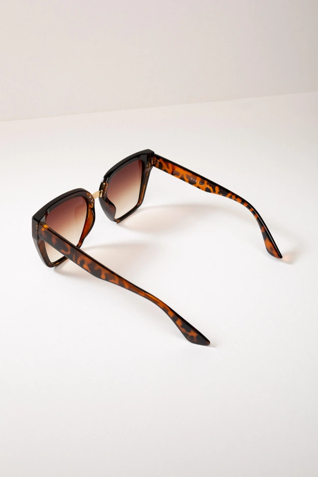 Brązowe okulary przeciwsłoneczne w panterkowej oprawie Makalu